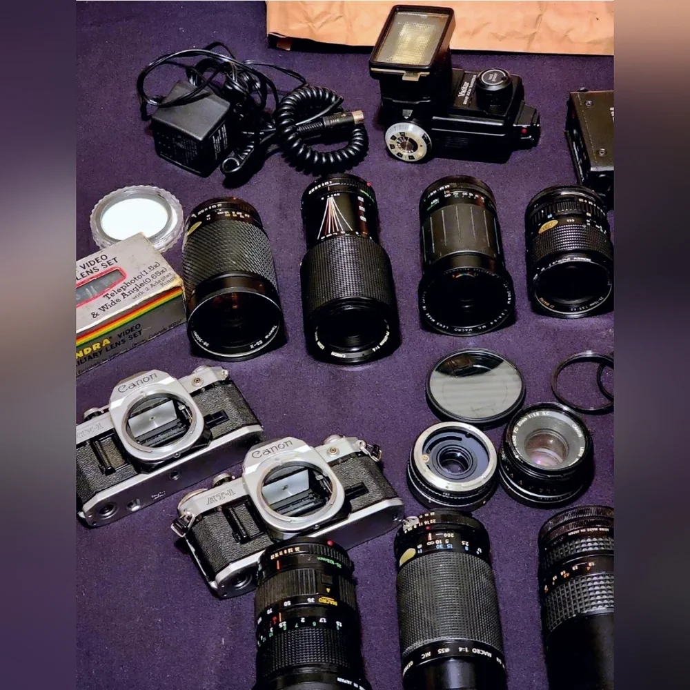 Two Canon cameras and lenses